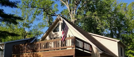 Front of house with large decks