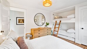 Bunk Room with queen, two bunks and twin trundle beds. 