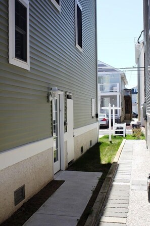 Private side entrance. Next to entrance door is private outside shower.