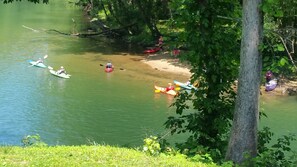 Sitting on the back porch watching the kayakers go by.