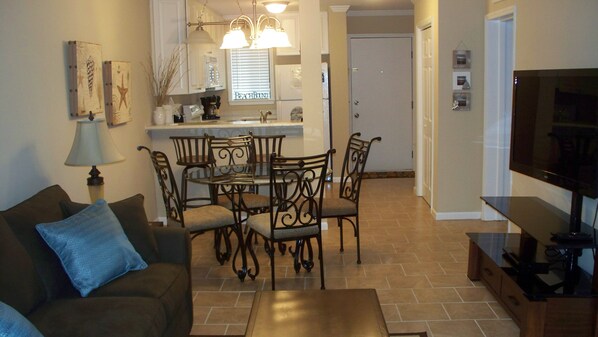 The Living Area offers a Queen Size Sofa Bed, 51' HDTV, Blu-ray player