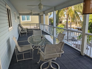 Screened in Balcony on 2nd floor with outdoor eating area.