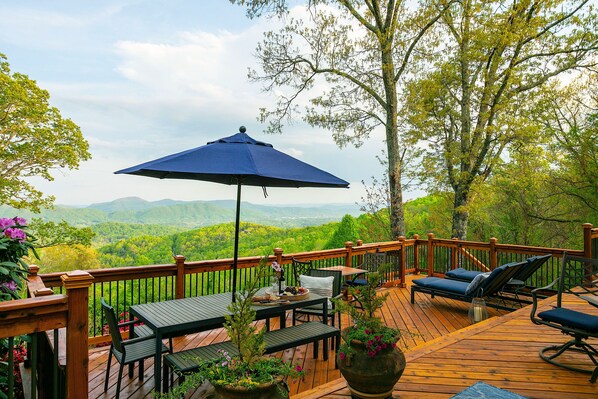 What a view! Relax on our 1200 sf deck with views that go on for miles . . . 