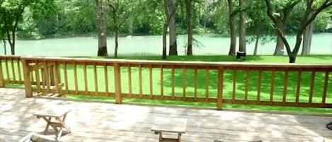 Relax on the large deck overlooking the beautiful yard and amazing views