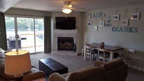 Seating for 10 to eat between dining table & bar stools