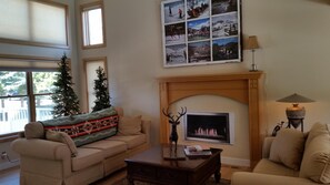 Conversational living room with local vintage photos. (fireplace coming soon)