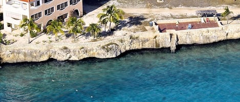 Breathtaking location on the Caribbean Sea with world class diving steps away!