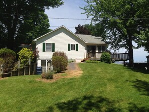 side view of home and access to deck.  