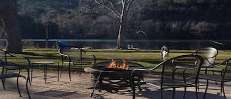 Backyard leading right into Lake with awesome patio and Firepit