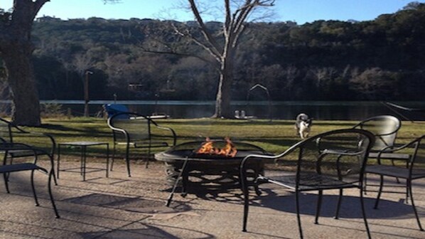 Backyard leading right into Lake with awesome patio and Firepit