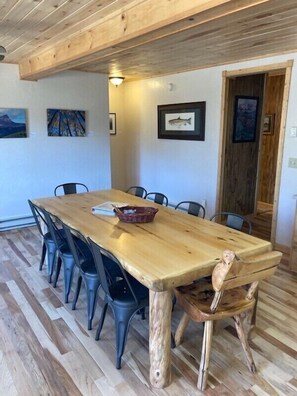 Huge kitchen table seats ten.