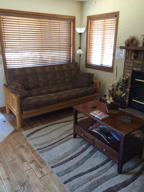 Futon converts to queen-size bed in the livingroom.