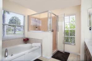 Master ensuite bathroom with huge walk in glass enclosed shower
