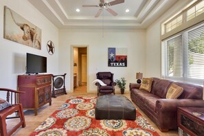 Media Room with sleeper sofa and wide screen TV