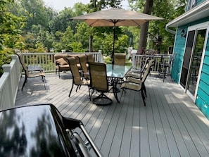 Spacious deck can seat the entire crew. Weber natural gas grill.