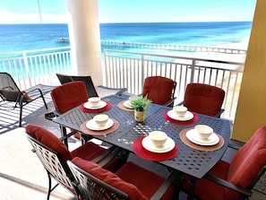 Massive balcony and comfortable chaise lounges await your arrival