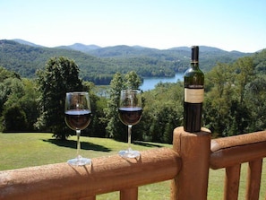 Enjoy a glass of wine on the deck overlooking the lake and mountain view.

