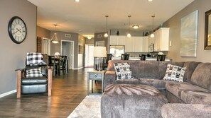 Large living room: leather reclining side chair, gas fireplace
