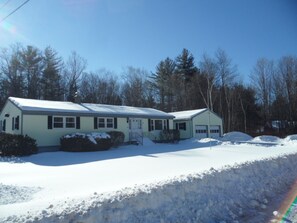 Front of house from street in winter