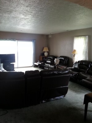 Sectional with recliners, and two additions couches with recliners.