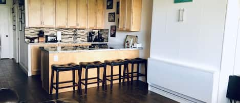 Kitchen and Murphy bed.