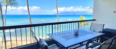 Dining on the lanai with views of neighboring islands.