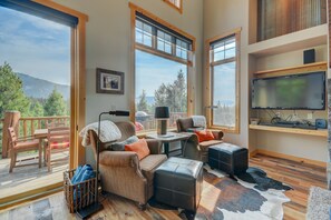 Arm Chairs with Reading Lamps and Ottomans 