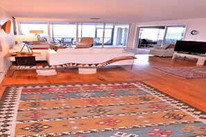 Living room with den to side