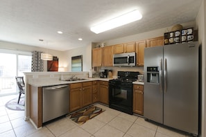 The brand new kitchen with all new Frigidaire Gallery stainless steel appliances