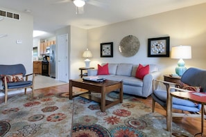 The living area opens up to the kitchen and dining room for easy entertaining!