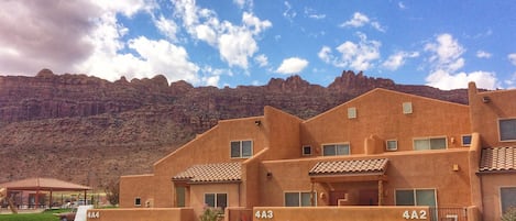 Our Townhome with the beautiful red cliffs of Moab just behind.