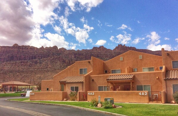 Our Townhome with the beautiful red cliffs of Moab just behind.