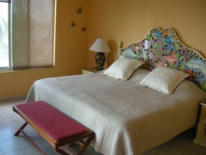 Master Bedroom with view to beach/ocean and sliding doors to balcony.