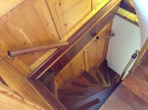 Feature wooden staircase viewed from 1st floor
