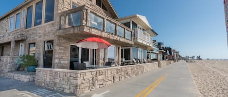 With a front row seat to the soft sand beaches of Newport, this oceanfront vacation home is perfect for families looking to enjoy the beach on a budget.