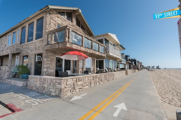 With a front row seat to the soft sand beaches of Newport, this oceanfront vacation home is perfect for families looking to enjoy the beach on a budget.