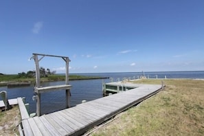 Boat dock and fish table for the fishermen with a boat launch at Scotch Bonnett