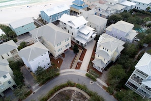 Aerial shot of Chelsea Loop, Tall Cotton is white house adjacent to beach access