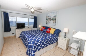 Bedroom with ocean view. Looking in from the door.