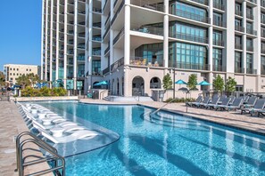 Enjoy a cocktail from the bar in the adult pool. Enough room for everyone