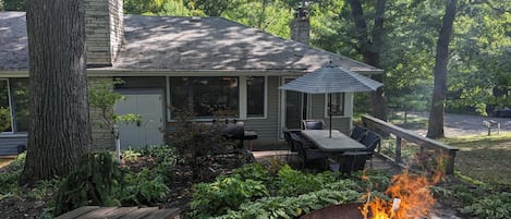 Backyard Relaxation with Firepit & Bench.  Deck furniture removed during winter.