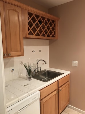 Kitchen with dishwasher.