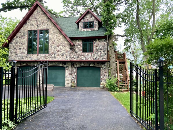 Street/ Driveway view of Coach House