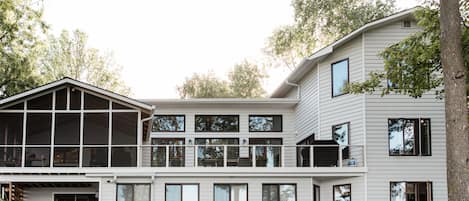 The front of the house with almost all rooms facing the lake