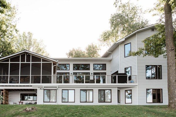 The front of the house with almost all rooms facing the lake