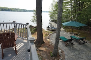 Private boat dock and rock patio.