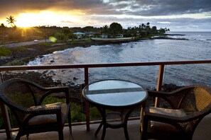 Enjoy your coffee while the sun comes up. Then snorkel below and next door.