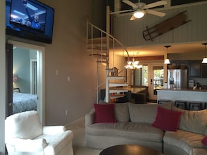 wood floors and staircase is now black also upstairs is enclosed