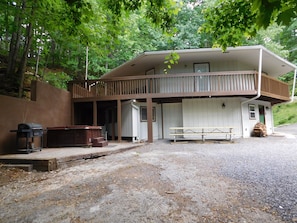 Ground level entry with grill/spa/picnic table and large wraparound deck!