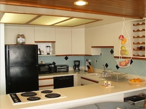 Fully loaded open kitchen w few new appliances. Cooking w oceanview & surf sound